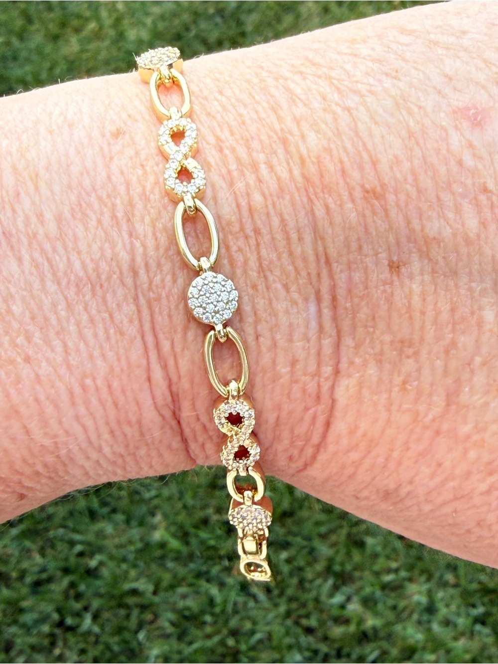 14k gold plated bracket with infinity design